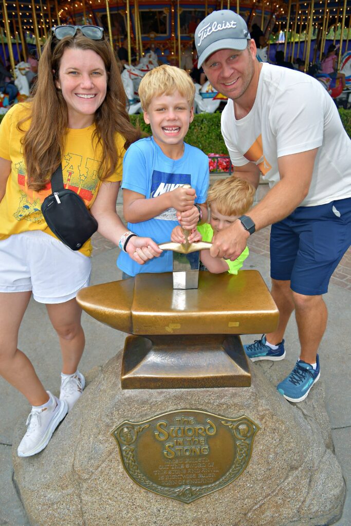 Pulling the Sword from the Stone at Disneyland where we stayed and flew for free