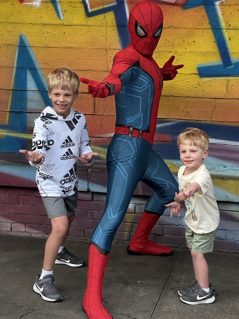 Meeting Spiderman at Disneyland where we stayed for free