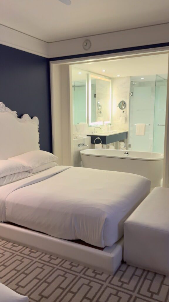 The Queen Bedroom at the Grand Hyatt Baha Mar which includes a beautiful shower and soaking tub 