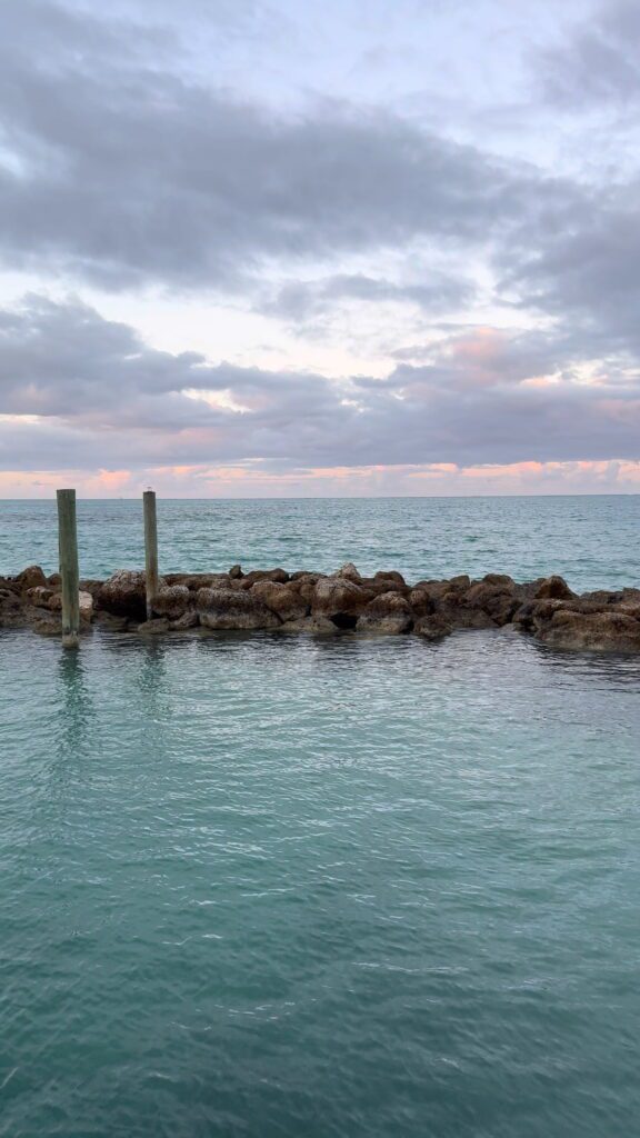 View of the ocean at sunset from the docks at Baha Mar 